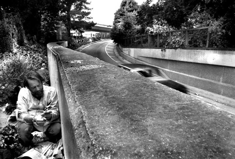 Frank hiding from traffic. Courtesy of the artist, Jeff Schonberg.