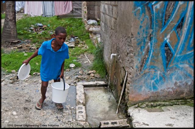 5.29 26 kid fetching water_jpg A Haitian boy fetches water in Leogane, the epicenter of the Jan. 12 earthquake. Photo courtesy Jennifer Britton/Drexel Engineering Cities Initiative