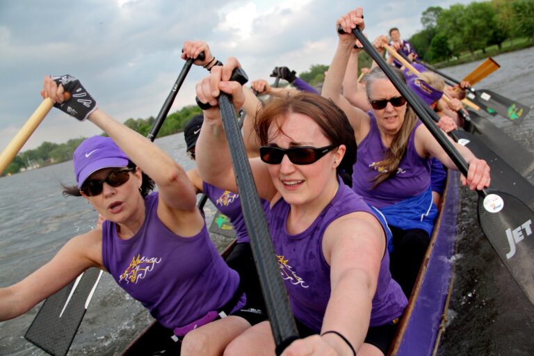 The Schuylkill Dragons paddle on the Cooper River in New Jersey. They are in negotiations with the city of Philadelphia to build new docks that would allow them to return to the Schuylkill River. (Emma Lee/for NewsWorks)