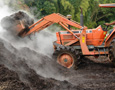 Tractor turning compost
