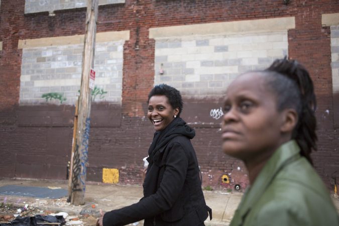 Diane Precht and her mom Daisy take a walk through their old neighborhood recently. (Photo by Jessica Kourkounis)