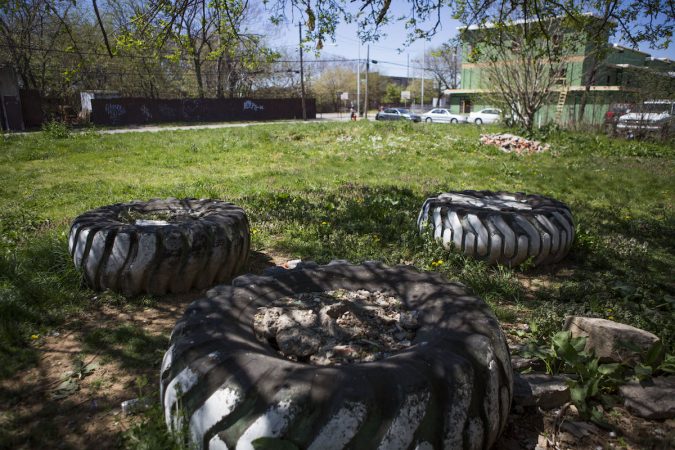 Remnants of a make shift playground still sit in an empty lot in Jewtown. (Photo by Jessica Kourkounis)