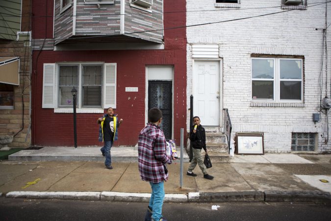 Neighborhood kids play on East Williams Street near Tulip Street in Jewtown. The white house is the former home of Diane Precht and her family. (Photo by Jessica Kourkounis)