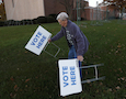 a volunteer puts up 