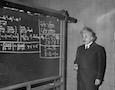 Albert Einstein at a chalkboard
