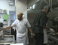 two chefs working at the EAT Cafe