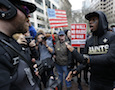 Protesters argue during a May Day protest