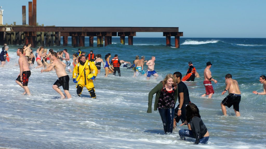 004_bs0665_2014-1200 More than 6000 people jumped into the Atlantic Ocean Saturday for the annual Polar Bear Plunge in Seaside Heights, N.J. (Bas Slabbers/for NewsWorks)