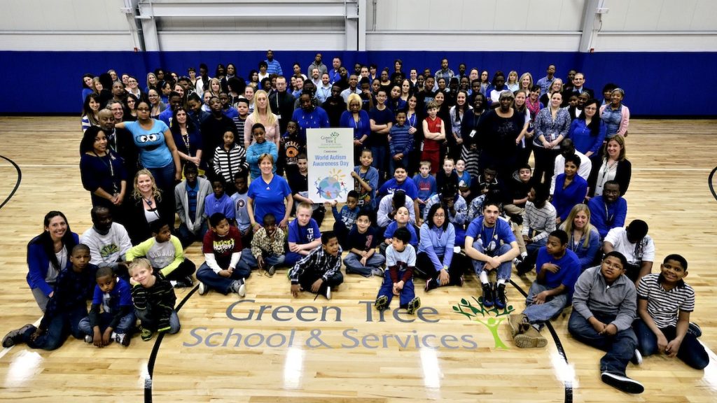 01_bs0684_fb Students and staff gathered for a group photo to celebrate World Autism Awareness Day at Green Tree School & Services on Wednesday. (Bas Slabbers/for NewsWorks)