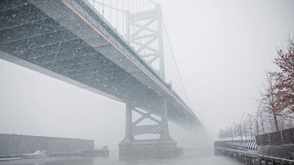 04wintry_weather1200_675 Wintry weather blankets the Benjamin Franklin Bridge and Race Street Pier in Philadelphia, March 5, 2015. Lindsay Lazarski/WHYY)