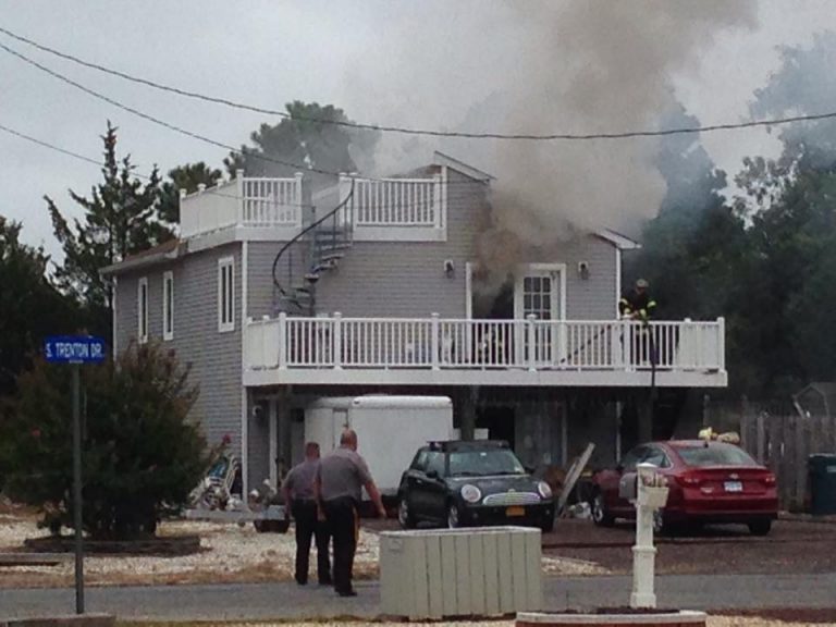 Smoke billowing from a house at 1 South Trenton Avenue in the Mystic Island section of Little Egg Harbor early Thursday afternoon. (Photo: JSHN contributor Rob Libonati)