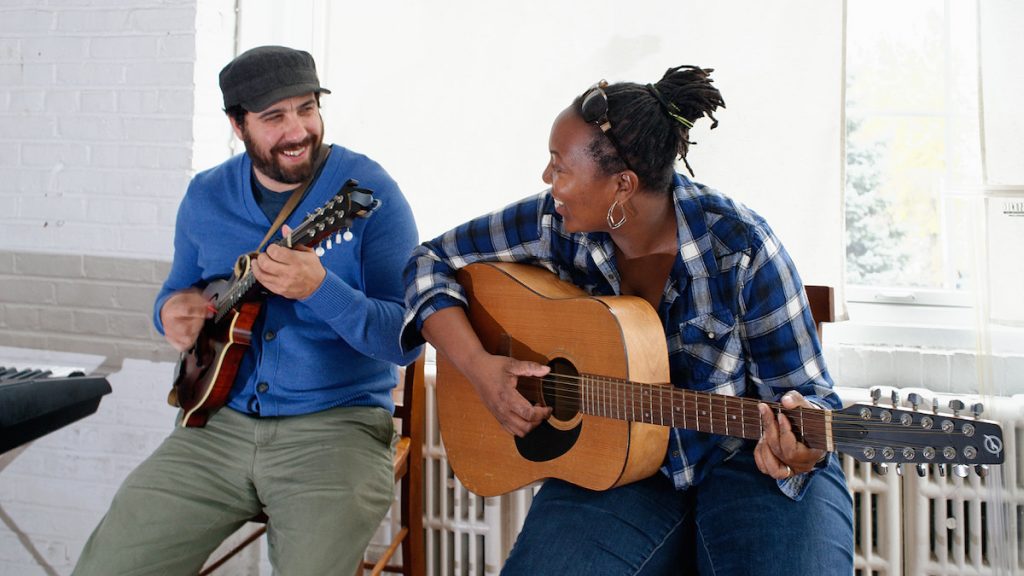 10_dd_bs1016_bas_9868 Adam Monaco and Danie Ocean, the Co-Executive Directors of Working While Playing in a Blue-grass jam session. (Bastiaan Slabbers/for NewsWorks)