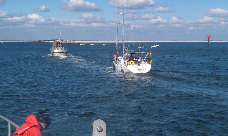  A Coast Guard vessel approaching the Barnegat Inlet today with a 42-foot disabled sailboat in tow. (Photo courtesy of the U.S. Coast Guard Station Barnegat Light) 