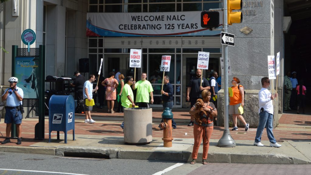 DSC_0169 Members of the carpenters union protest outside the Pennsylvania Convention Center Monday. Postal workers are having their annual meeting there. (Tom MacDonald/WHYY)
