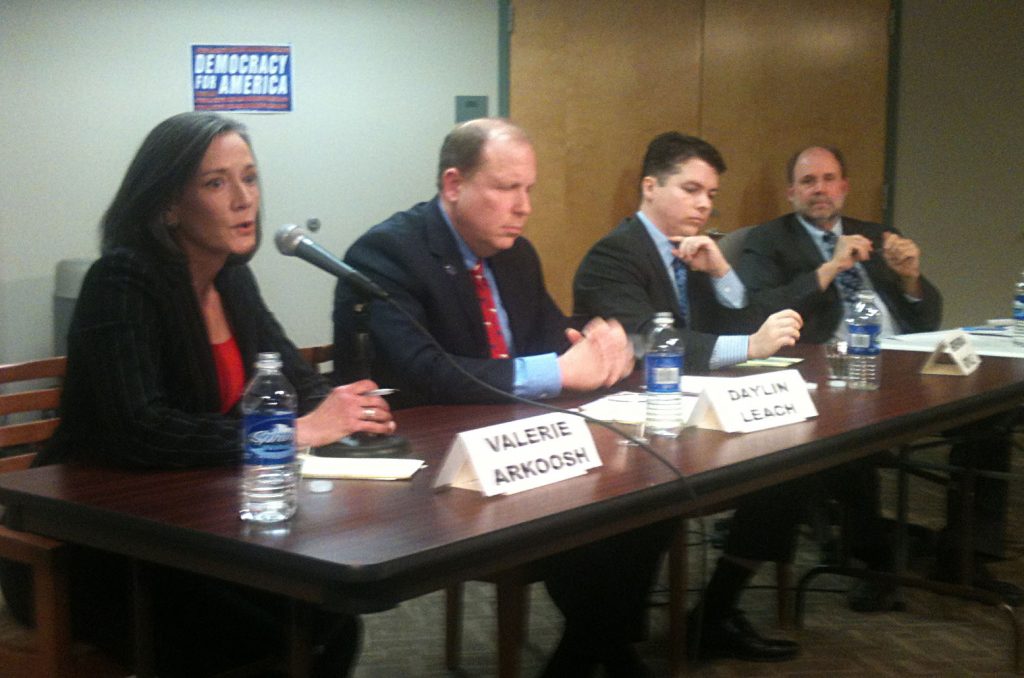 13th-forum Congressional candidates Valerie Arkoosh, Daylin Leach, and Brendan Boyle join moderator Will Bunch (right) at a forum Sunday. (Newsworks photo/Dave Davies)