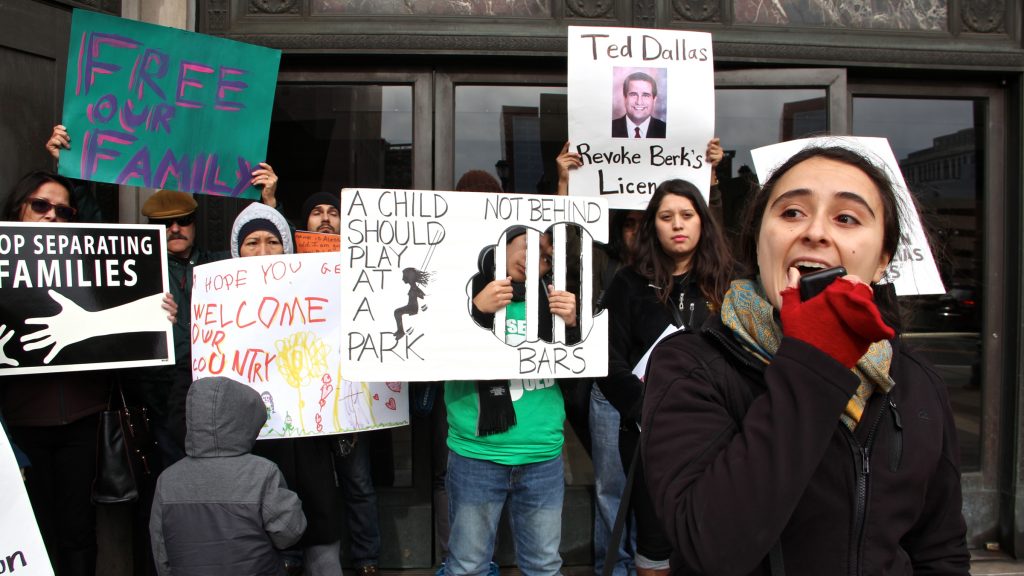 1berks family detention protest Yared Portillo of Juntos speaks at a rally outside 801 Market St. to call for the closing of the Berks County Residential Center, one of three centers in the country used to detain families whose immigration status is undetermined. (Emma Lee/WHYY)