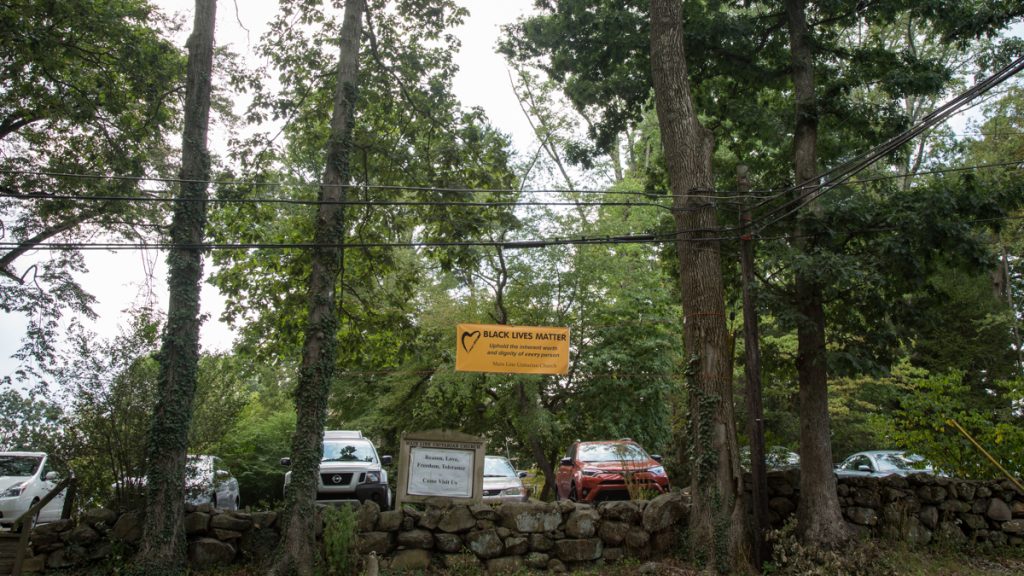 The Main Line Unitarian Church hangs a banner in support of the Black Lives Matter movement. Church members voted 92 percent in favor of publicly showing support for the movement. (Emily Cohen for NewsWorks)