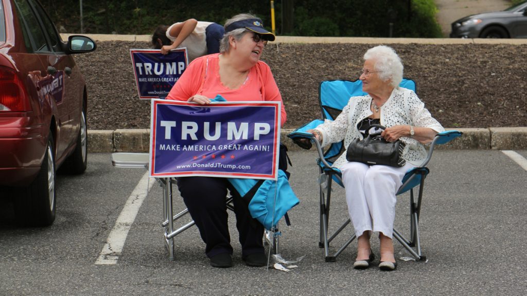 1republican women Women wait in the parking lot of the Springfield Mall in Delaware County, a stop for the National Federation of Republican Women who are traveling the country encouraging Republican women to vote. (Emma Lee/WHYY)