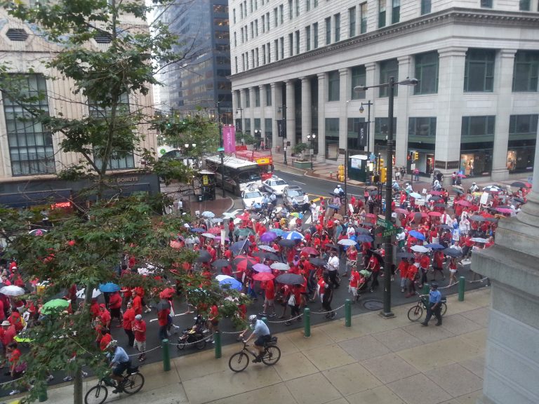 Hundreds of protesters, many of them teachers,  march through Philadelphia to demand more school funding. (Tom MacDonald/WHYY)  