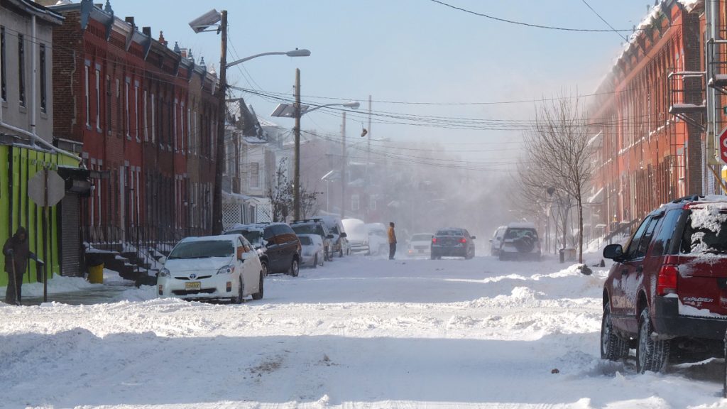  Gusty winds creates a mist over this Trenton street. (Alan Tu/WHYY) 