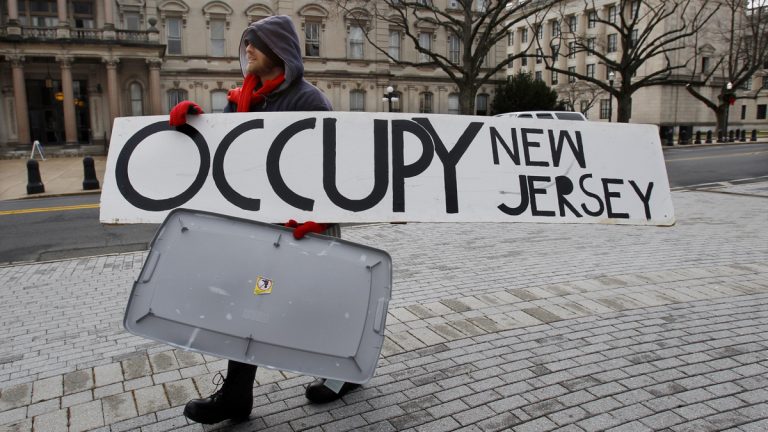  Dusty Hinz, of Philadelphia, outside the Statehouse in Trenton, N.J. Saturday. (AP Photo/Mel Evans) 