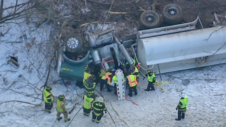  Overturned tractor-trailer off the NJ Turnpike. (Image via NBC10) 