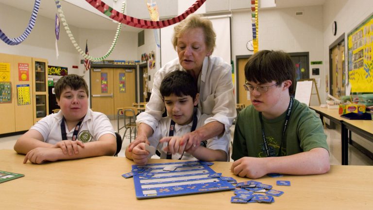  Special education teacher Karen Hansen works with students at the Long Branch Middle School in Long Branch, N.J., Friday, June 1, 2007.   (AP File Photo/Colin Archer) 