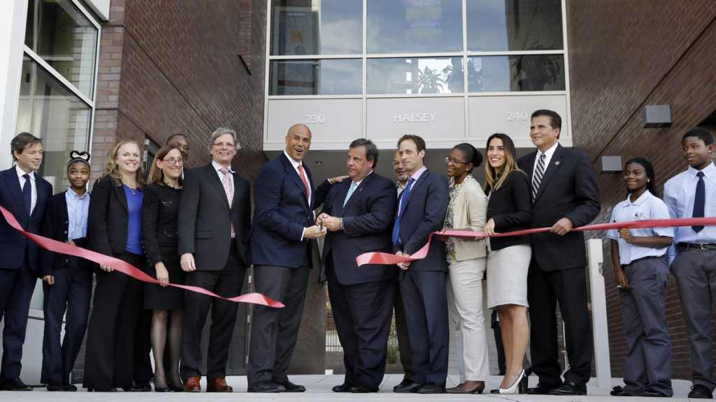 Chris Christie, Cory Booker Mayor Cory Booker, center left and Gov. Christie, center right, help celebrate the opening of a new charter school in Newark, N.J. on Sept. 25, 2013. Booker is now in the U.S. Senate.(AP Photo/Mel Evans)