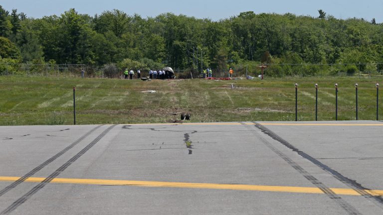  Skid marks at the end of the runway at Hanscom Field. (AP Photo/Boston Herald, Mark Garfinkel, Pool) 