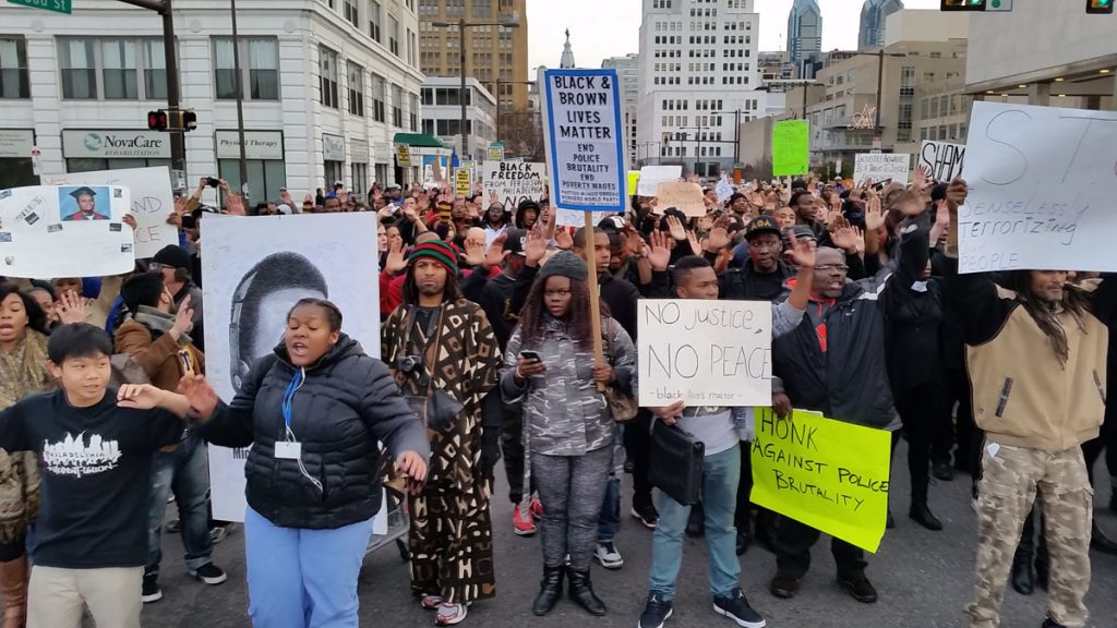 20141125_155936 Hundreds of demonstrators marched through Philadelphia Tuesday to show their solidarity with protesters in Ferguson