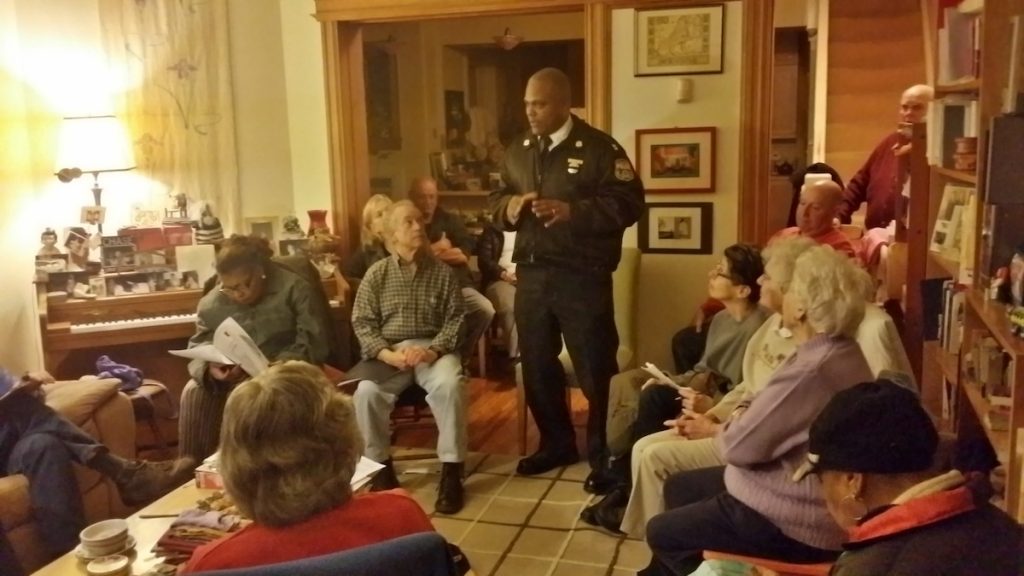 20150402_195851_richtonehdr Captain Sekou Kinebrew meets with members of the Mt. Airy-Nippon-Bryan-Cresheim Town Watch. (Queen Muse/for NewsWorks)