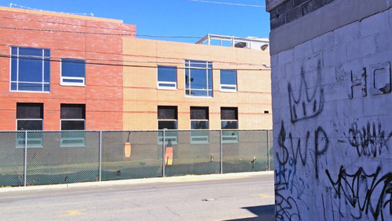  The building behind the fence will be the new KIPP Cooper Norcross Academy.  