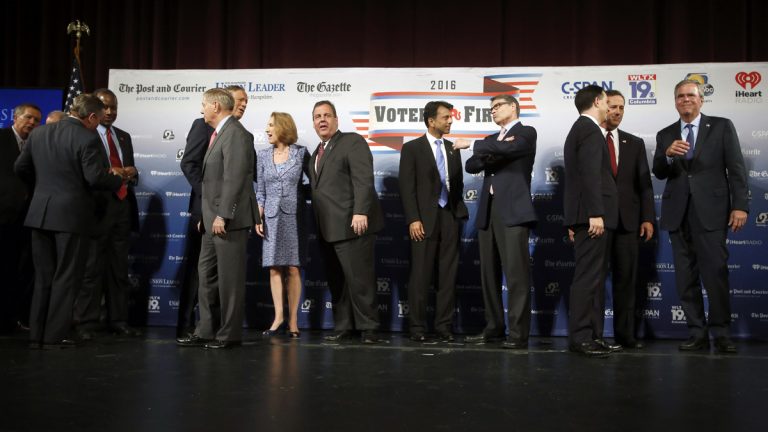  Republican presidential candidates speak among themselves after last night's forum in N.H.  Steven DiSalvo. (AP Photo/Jim Cole) 