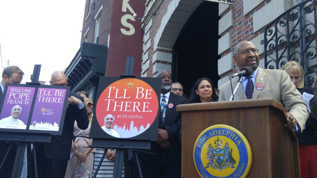  Mayor Michael Nutter discusses the new designation of the 'traffic box' as the 'Francis Festival Grounds.' (Tom MacDonald/WHYY) 