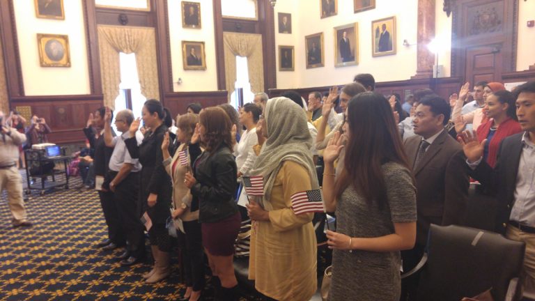  Thirty-three men and women from 19 countries took the Oath of Citizenship at City Hall in Philadelphia Wednesday.(Tom MacDonald/WHYY) 