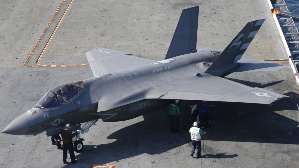  An F-35C Lightning II test aircraft taxies on the deck aboard the nuclear powered aircraft carrier USS Dwight D. Eisenhower of the coast of Norfolk, Va., Friday, Oct. 9, 2015. The aircraft is scheduled to be deployed in 2018. (AP Photo/Steve Helber, file) 