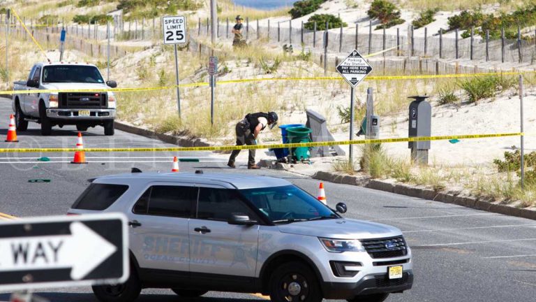 A bomb squad technician near the garbage can explosion site in Seaside Park Saturday