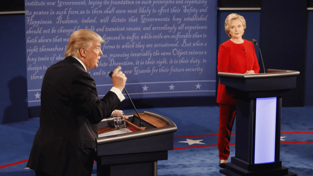 20160926-clash Republican presidential nominee Donald Trump gestures during the presidential debate with Democratic presidential nominee Hillary Clinton at Hofstra University in Hempstead