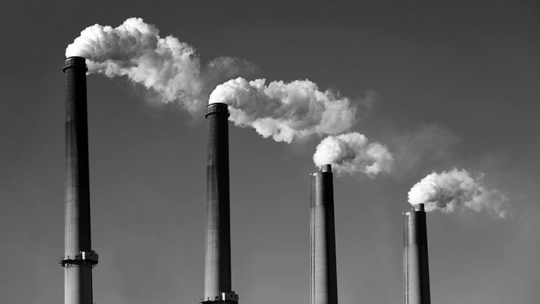 Industrial smoke stacks. (Big Stock image)
