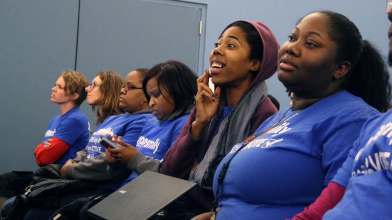 KIPP charter school supporters wait to hear whether applications for two new charters will be approved. (Emma Lee/WHYY)