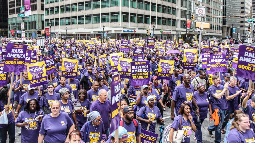 32BJ SEIO janitors marched through Center City Wednesday to demand fair wages. (Kimberly Paynter/WHYY)