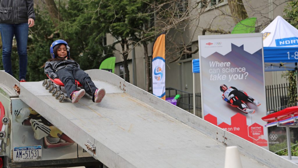 4-5 After building a miniature luge kids were able to test the action sliding down down a track themselves (Natavan Werbock/for NewsWorks)