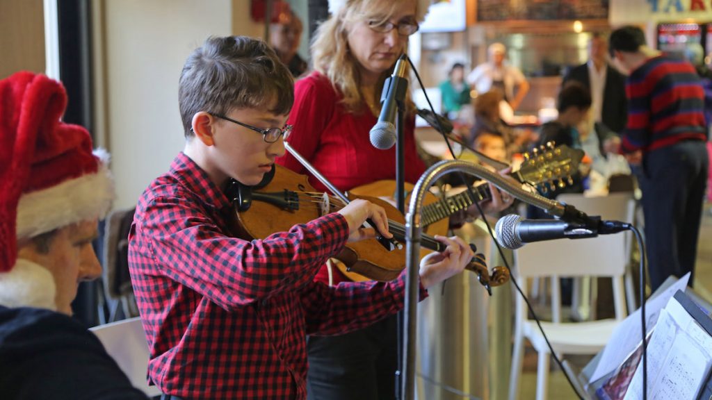 Nicholas Arisi, 11, a student at Cintioli Music School performing on violin (Natavan Werbock/for NewsWorks)