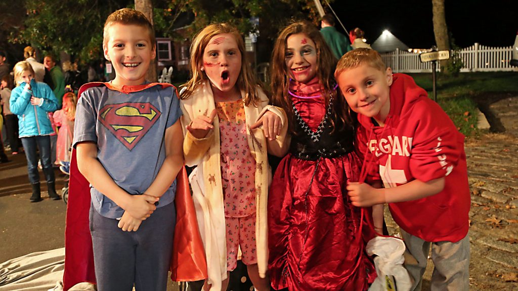 6-2 (From left to right) Jack, Maddie, Erin and Matthew from Cranberry Pines Elementary School happy to stay up late and watch the parade (Natavan Werbock/for NewsWorks)