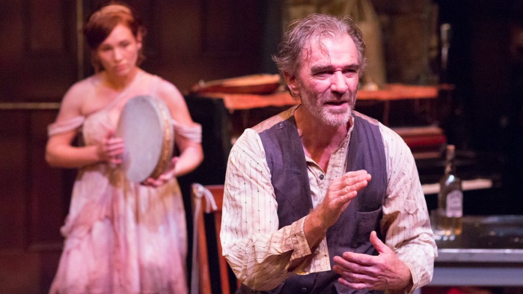 6675-8 Liz Filios as the muse and Peter DeLaurier as the poet in Lantern Theater Company's production of 'An Iliad.' (Photo courtesy of Mark Garvin)
