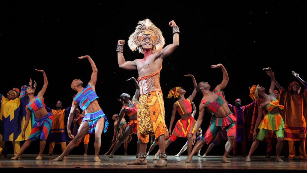 675-116 Jelani Remy as the older Simba and the ensemble in the song 'He Lives in You' from 'The Lion King' national tour. (Photo courtesy of Joan Marcus)
