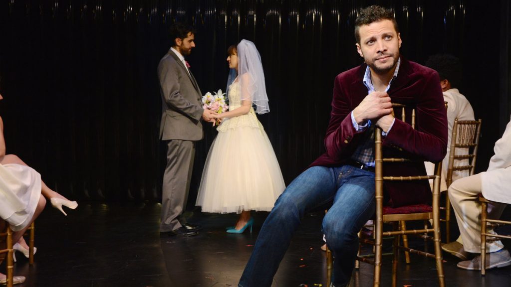 675-126 In the foreground, Justin Guarini, with John Caliendo and Kate Wetherhead in the background in Bucks County Playhouse's production of 'Company.' (Photo courtesy of Mandee Kuenzle)