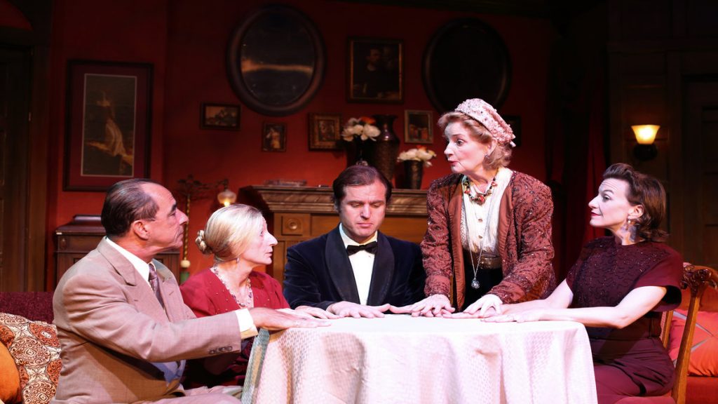 675-30 Around the seance table, left to right: Thomas Grube, Isabella Knight, Julian Elfer, Jennifer Harmon and Michelle Eugene, in Cape May Stage's production of 'Blithe Spirit.' (Photo courtesy of Aleksey Photography.)