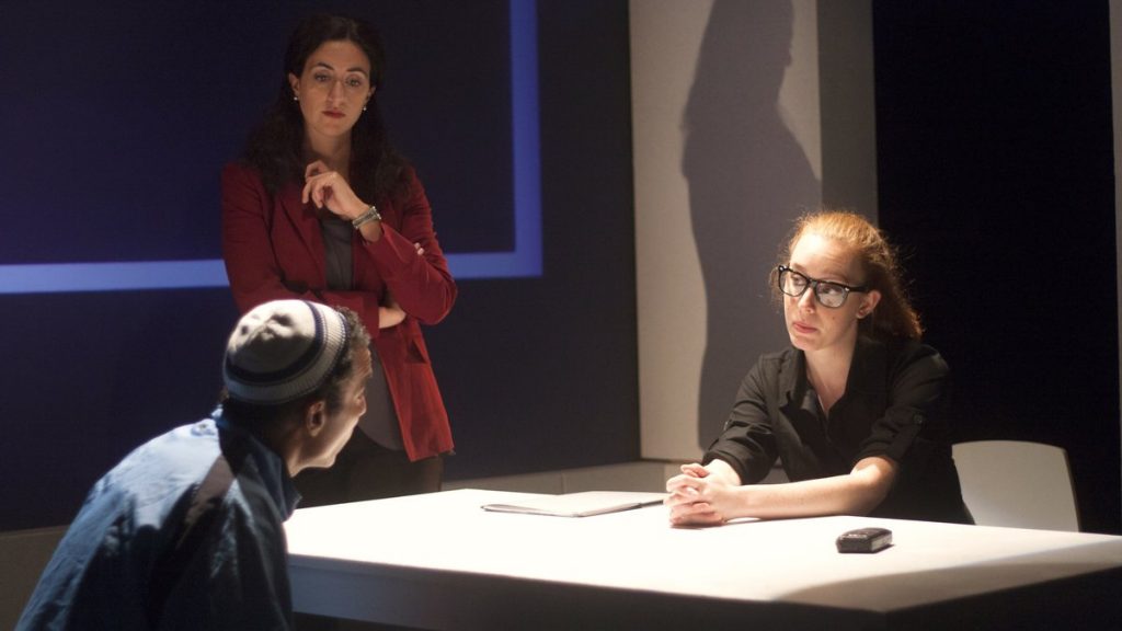 675-52 J. Paul Nicholas is interrogated by Felicia Leicht and Isa St. Clair in the Inis Nua production of 'Ciphers.' (Photo courtesy of Katie Reing)