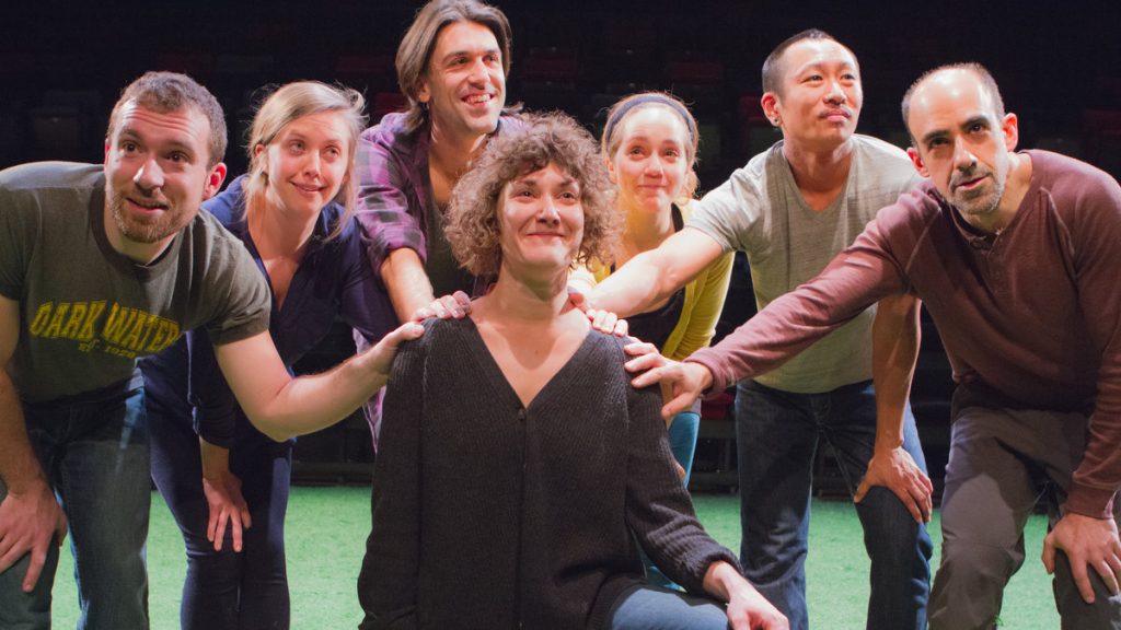 675-70 The members of Team Sunshine Performance Corporation's 'The Sincerity Project' at FringeArts: In the center is Melissa Krodman. The other cast members, who have her back, from left: Ben Camp, Jenna Horton, Mark McCloughan, Rachel Camp, Makoto Hirano and Aram Aghazarian.